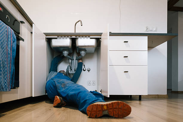 Professional Drain Cleaning technician working in Robins, IA